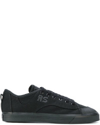 schwarze Leder Turnschuhe von Adidas By Raf Simons