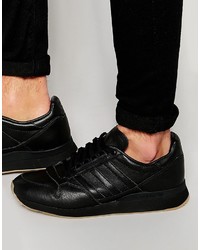 schwarze Leder Turnschuhe von adidas