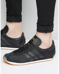 schwarze Leder Turnschuhe von adidas