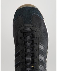 schwarze Leder Turnschuhe von adidas