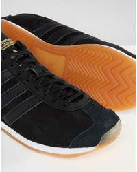 schwarze Leder Turnschuhe von adidas