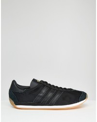 schwarze Leder Turnschuhe von adidas