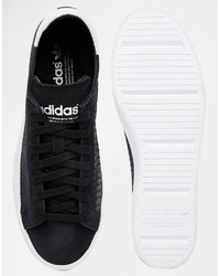 schwarze Leder Turnschuhe von adidas