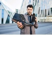 schwarze Lederfreizeitstiefel von Rieker