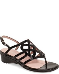 schwarze Ledersandalen mit geometrischem Muster