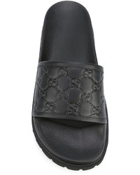 schwarze Ledersandalen von Gucci