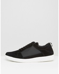 schwarze niedrige Sneakers