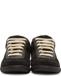 schwarze niedrige Sneakers