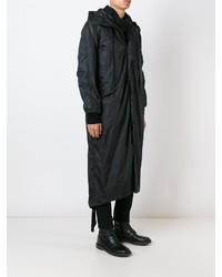 schwarze Regenjacke