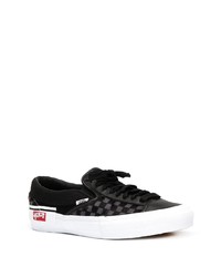 schwarze Segeltuch niedrige Sneakers mit Karomuster von Vans