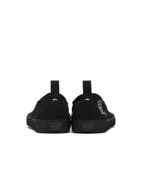 schwarze Slip-On Sneakers aus Segeltuch von Maison Margiela