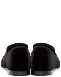 schwarze Slipper von Giuseppe Zanotti