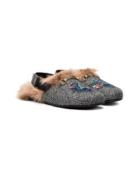 schwarze Slipper von Gucci