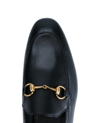 schwarze Slipper von Gucci