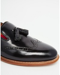 schwarze Slipper von Grenson