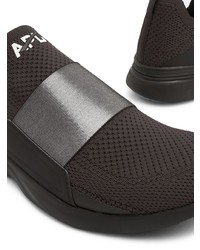 schwarze Sportschuhe von APL Athletic Propulsion Labs