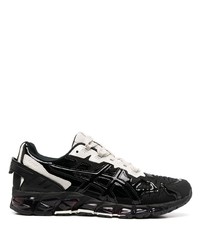 schwarze Sportschuhe von Asics