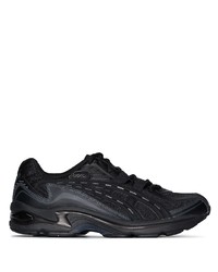 schwarze Sportschuhe von Asics