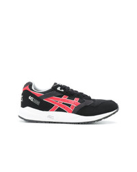 schwarze Sportschuhe von Asics