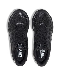 schwarze Sportschuhe von Asics