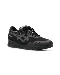 schwarze Sportschuhe von Asics