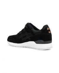 schwarze Sportschuhe von Asics