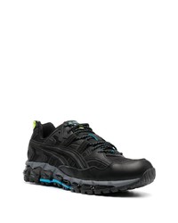 schwarze Sportschuhe von Asics