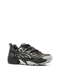 schwarze Sportschuhe von Asics