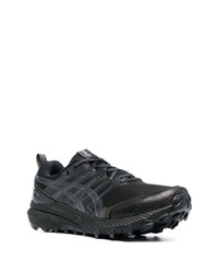 schwarze Sportschuhe von Asics