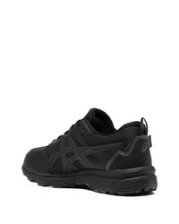 schwarze Sportschuhe von Asics