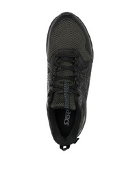 schwarze Sportschuhe von Asics