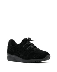 schwarze Sportschuhe von Asics