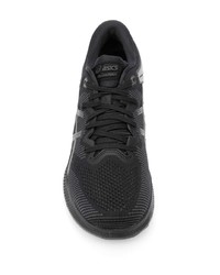 schwarze Sportschuhe von Asics