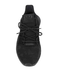 schwarze Sportschuhe von adidas