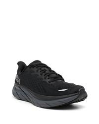 schwarze Sportschuhe von Hoka One One