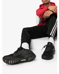 schwarze Sportschuhe von Adidas By Pharrell Williams