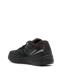 schwarze Sportschuhe von And Wander