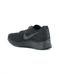 schwarze Sportschuhe von Nike