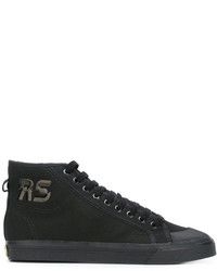 schwarze Turnschuhe von Adidas By Raf Simons