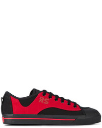 schwarze Turnschuhe von Adidas By Raf Simons