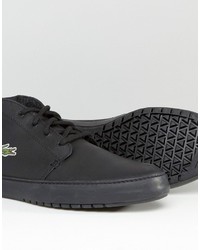 schwarze Turnschuhe von Lacoste