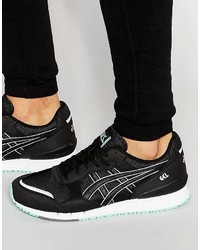 schwarze Turnschuhe von Asics