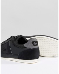 schwarze Turnschuhe von Lacoste