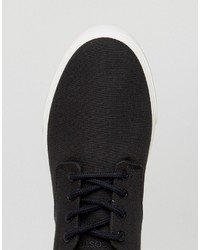 schwarze Turnschuhe von Lacoste