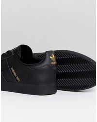 schwarze Turnschuhe von adidas