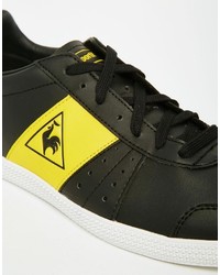 schwarze Turnschuhe von Le Coq Sportif