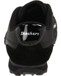 schwarze Turnschuhe von Skechers