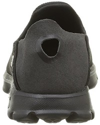 schwarze Turnschuhe von Skechers