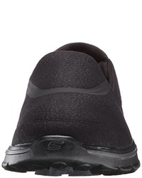 schwarze Turnschuhe von Skechers