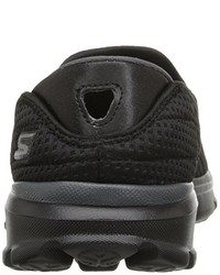 schwarze Turnschuhe von Skechers